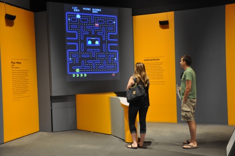 Visitors interacting with the Art of Video Games exhibition at the Brooks Museum. (Source: Memphis Brooks Museum of Art)